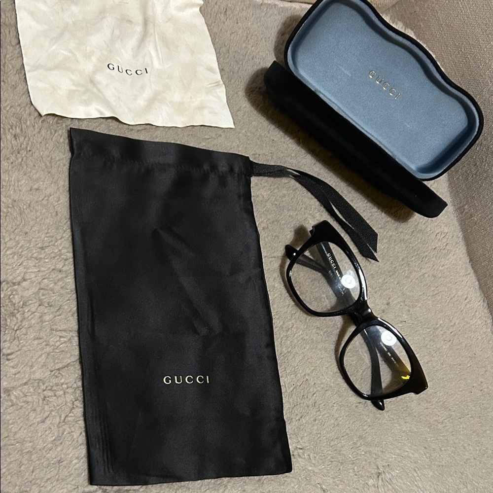 New gucci glasses. Never worn. Authentic. Cloth & case included.